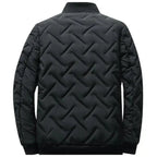 Sort quiltet bomberjakke til herre set bagfra — Bjerrelund